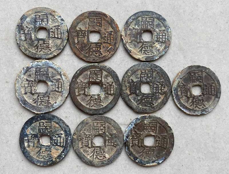 Tiền xu phong thủy đặt trong huyệt mộ